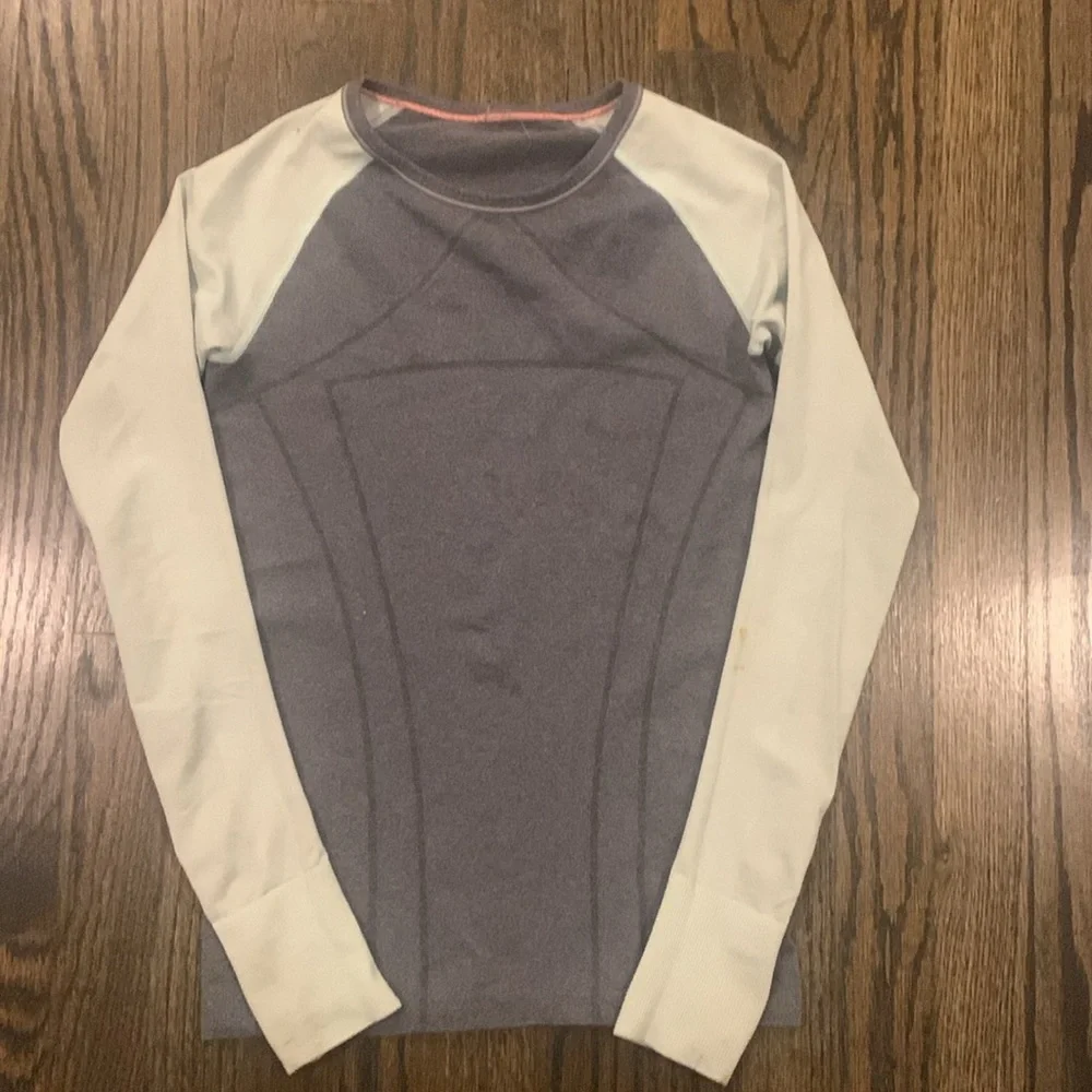 Girls long sleeve Ivivva top Tag with size missing.  Appears to be a youth 12
